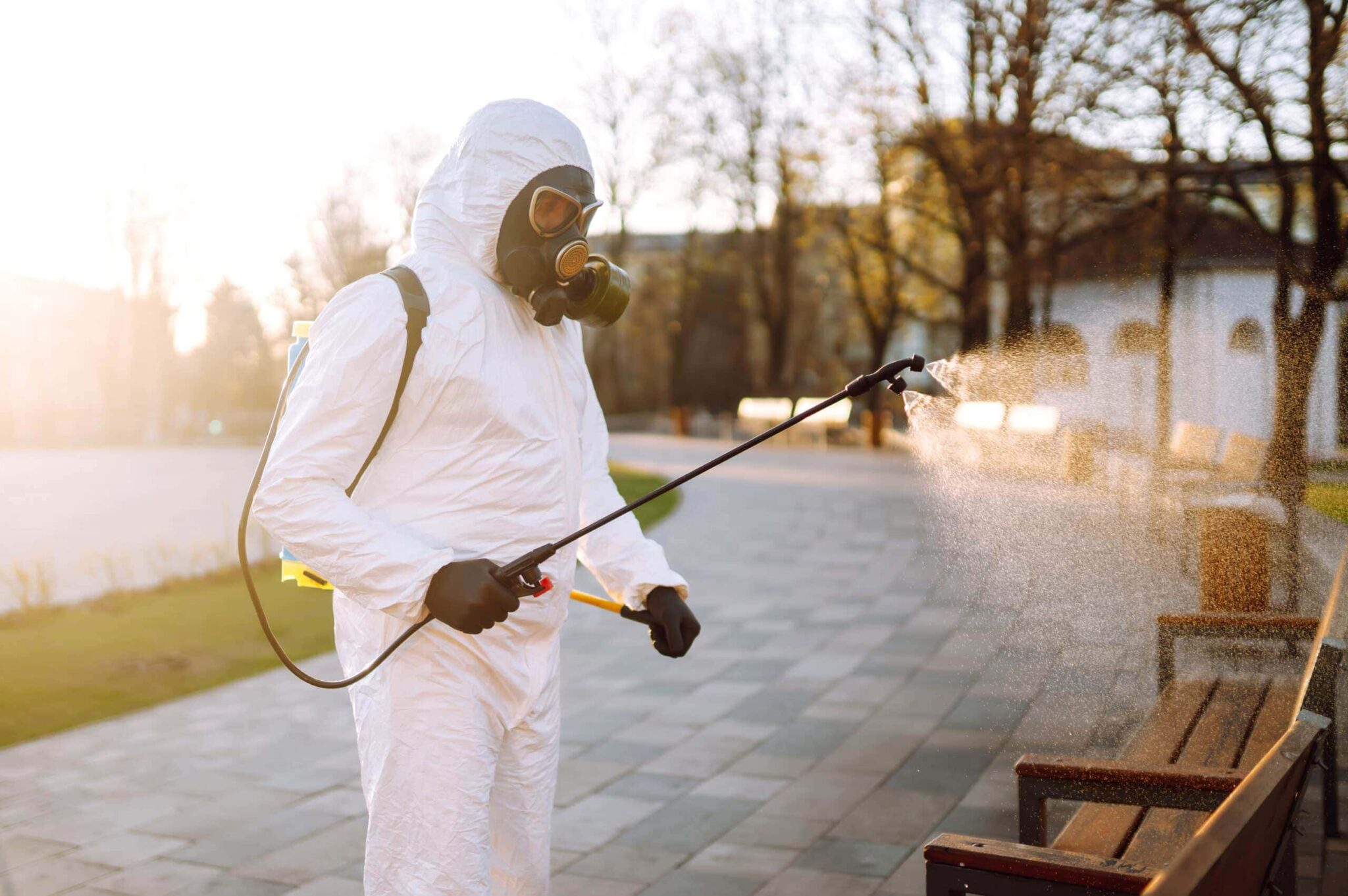 man-wearing-protective-suit-disinfecting-public-pl-2025-03-06-11-49-37-utc-scaled